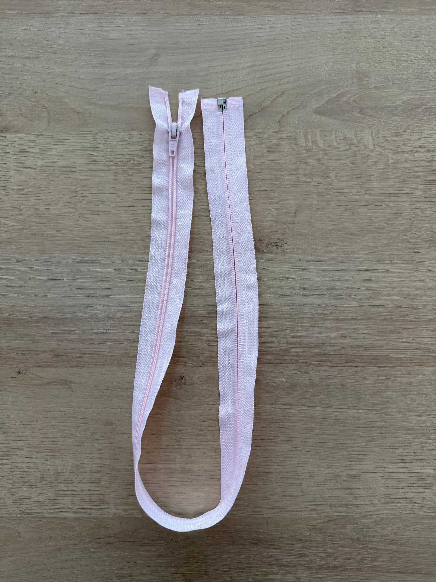 Zíper destacável Nylon Rosa bebê 60cm - R$ 9,90