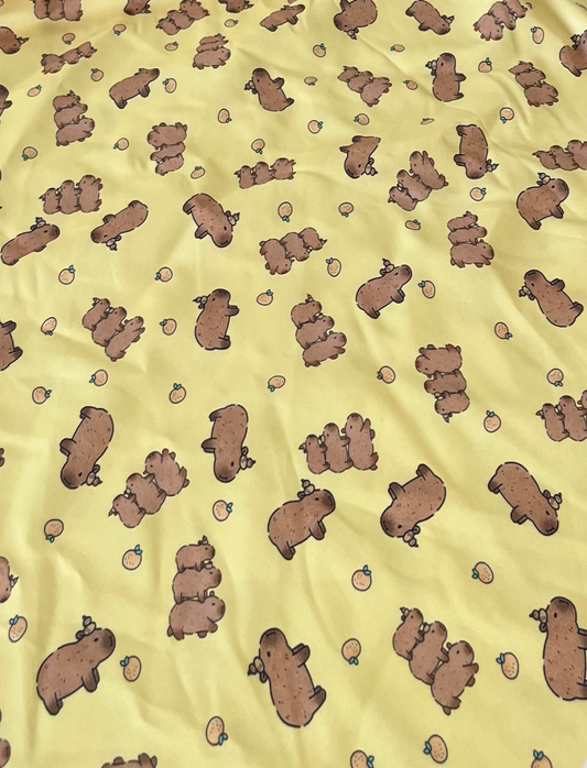 Malha para pijama Capivara fundo Amarelo - R$ 29,90/metro