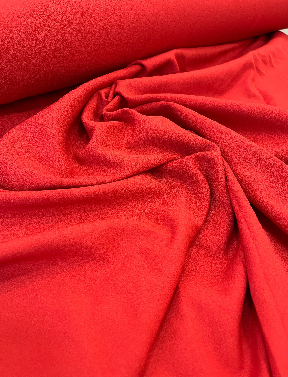 Crepe de poliéster com elastano vermelho queimado
